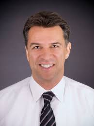 Stewart Madden, Broker