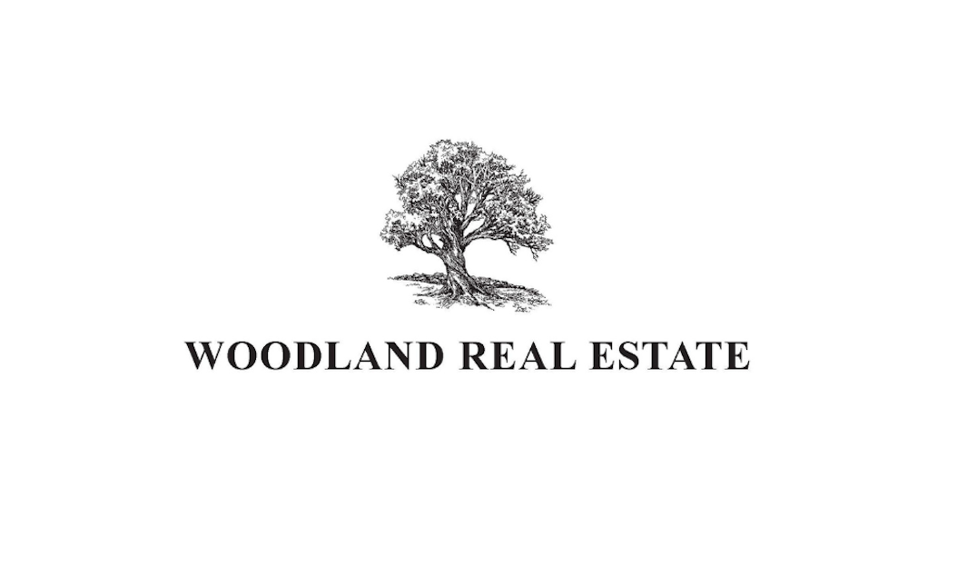 Erica Rodman - Woodland Real Estate